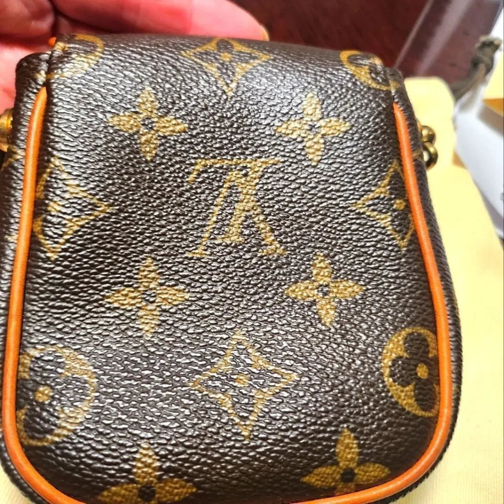 Louis Vuitton Pochette Cancun Monogram Mini Bag